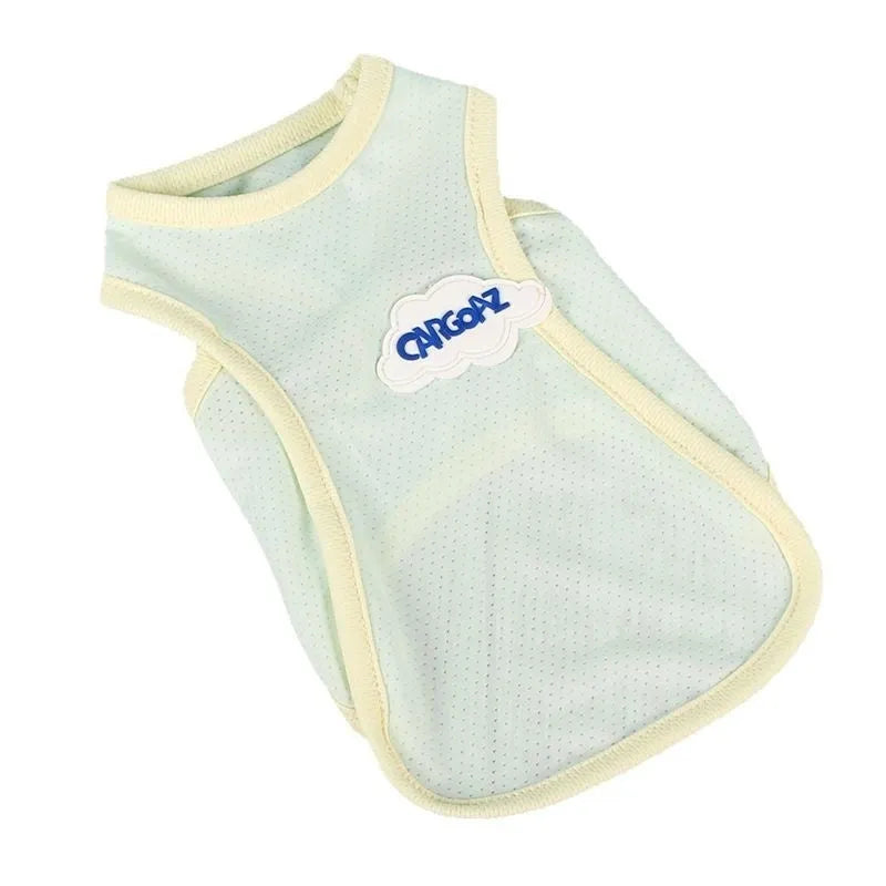 Cat wearing thin polyester summer vest in grass green colour