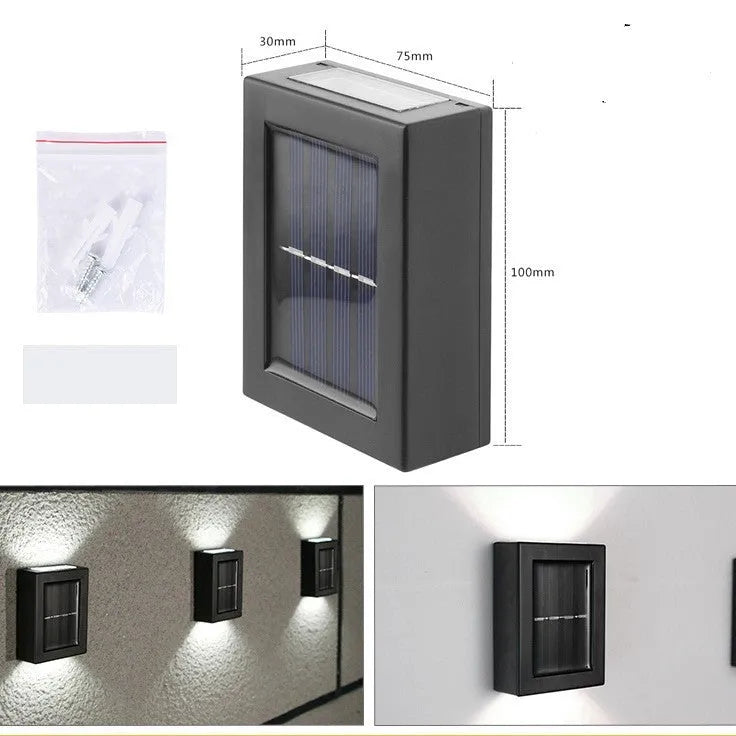 Solar garden wall light with LED illumination for outdoor decorative lighting