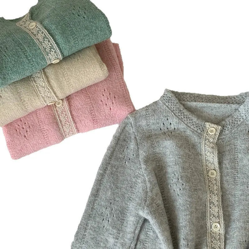 Loose apricot-coloured Korean-style cardigan sweater coat with regular sleeves on a hanger.