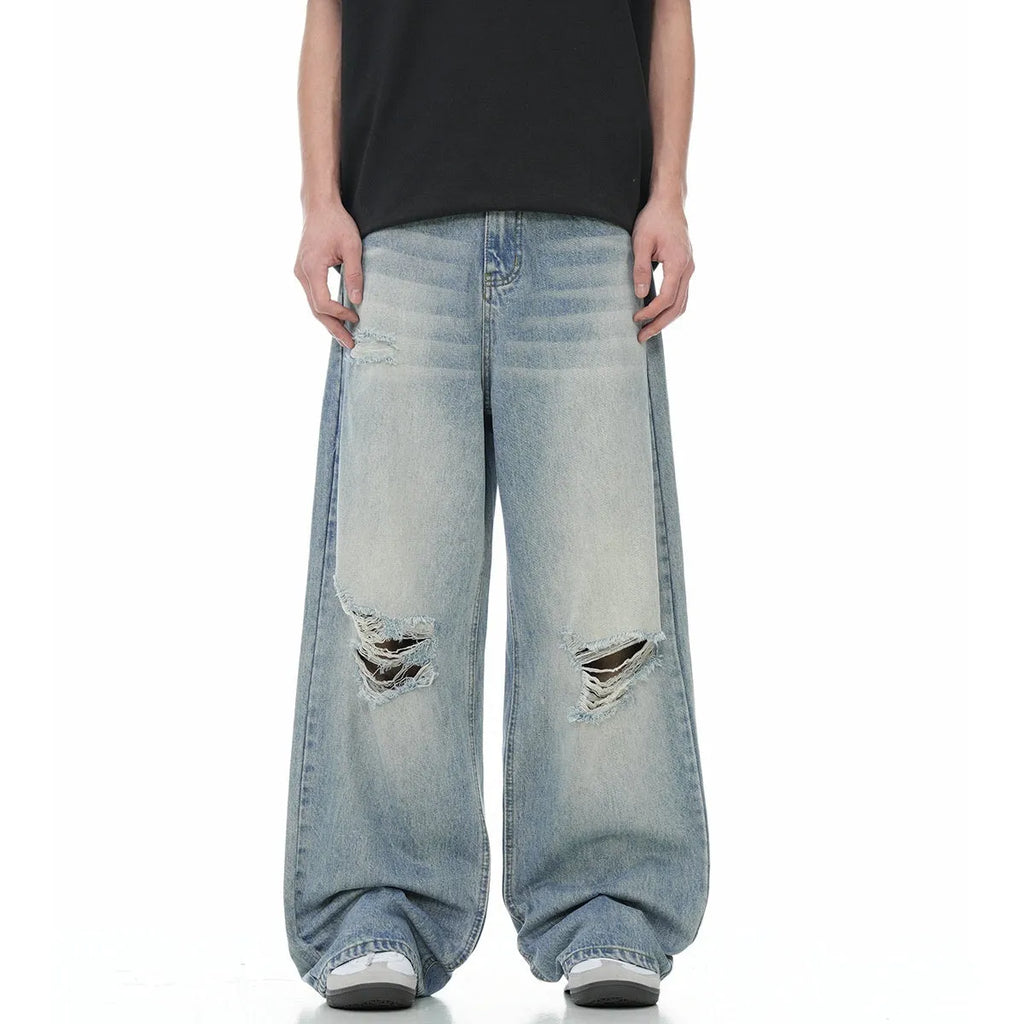 Blue men's straight-leg jeans with ripped detailing and an adjustable waistband.