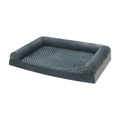 Light grey cloth dog kennel with raised sides for a medium-sized dog, shown on a wooden floor.