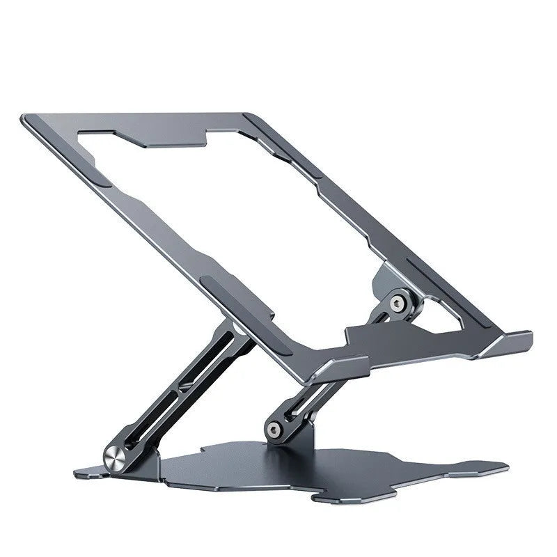 Grey aluminium folding laptop stand holding a silver laptop at an angle on a wooden desk.