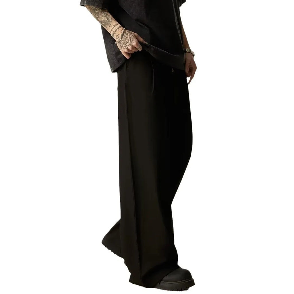 Men's solid black vertical tube wide-leg casual trousers with a button fly and straight-leg style.