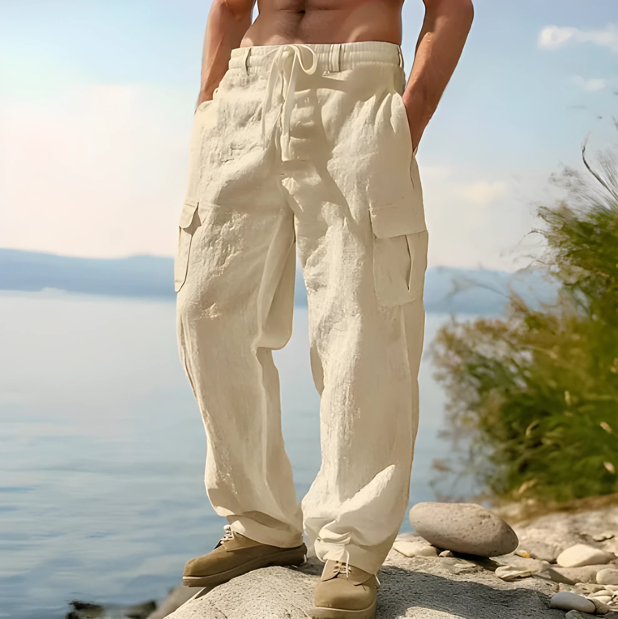 Man wearing loose-fitting, solid-colour cotton wide-leg casual trousers.