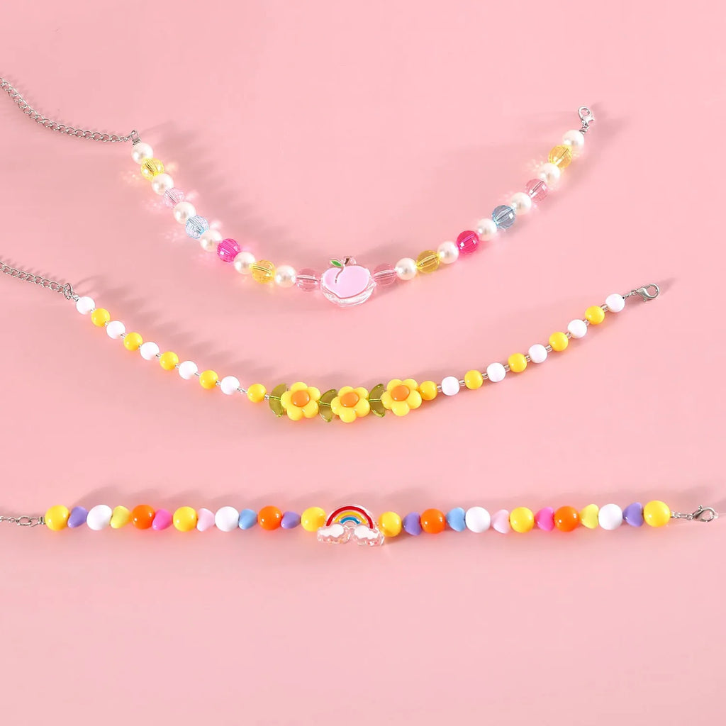 Colourful plastic bead pet necklace in peach, rainbow, or small flower patterns with adjustable sizing.