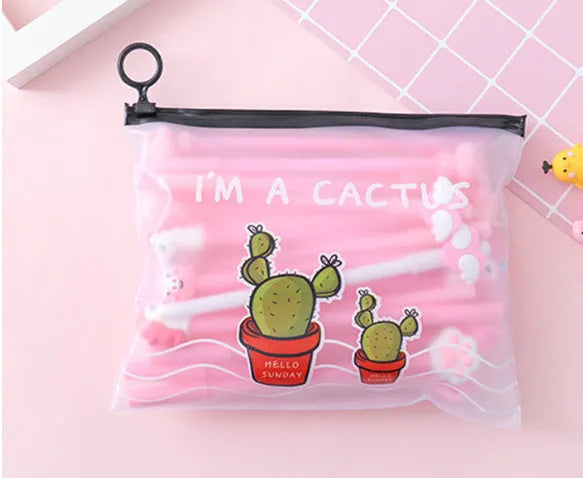 Set of twenty black 0.5mm gel pens with cartoon cactus designs in a plastic storage case measuring 21x17 cm