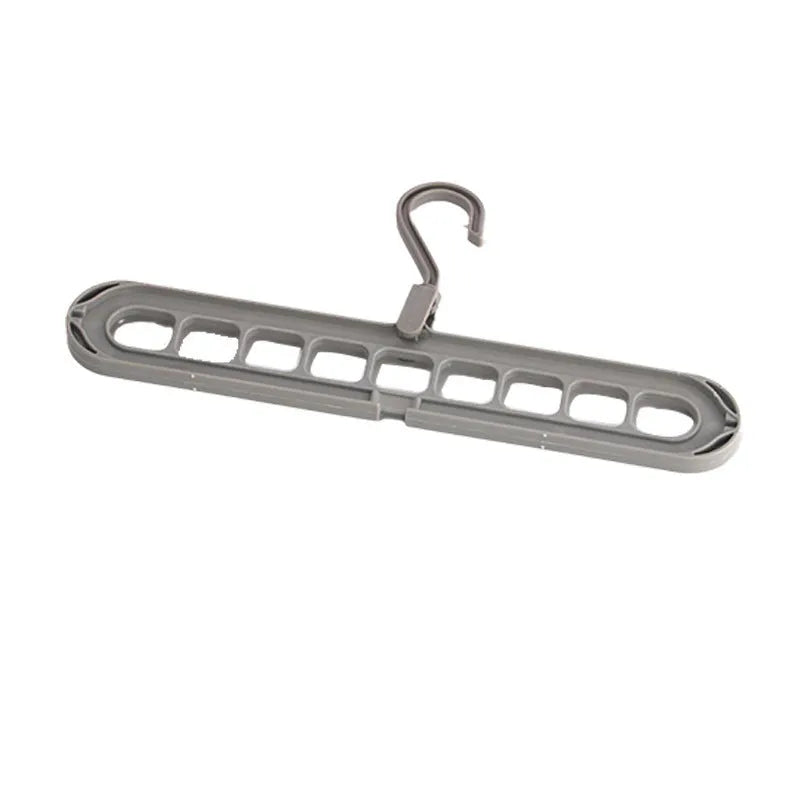 A plastic nine-hole seamless folding hanger for trousers, shown in one of five available colours.