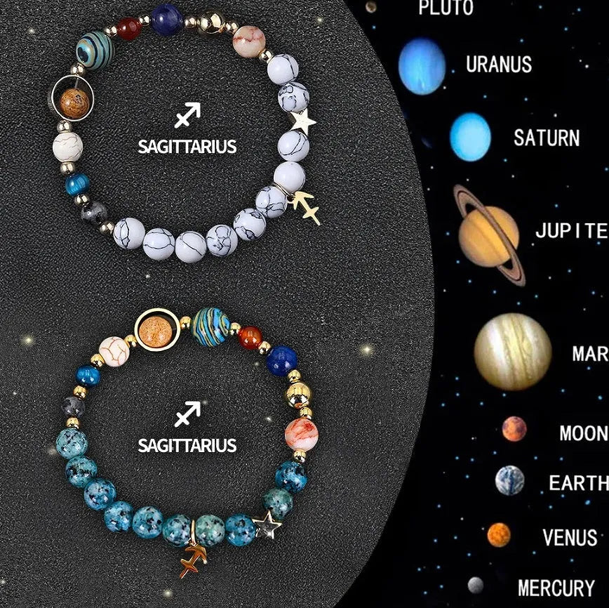 Set of two natural stone beaded bracelets featuring zodiac sign designs on a dark background
