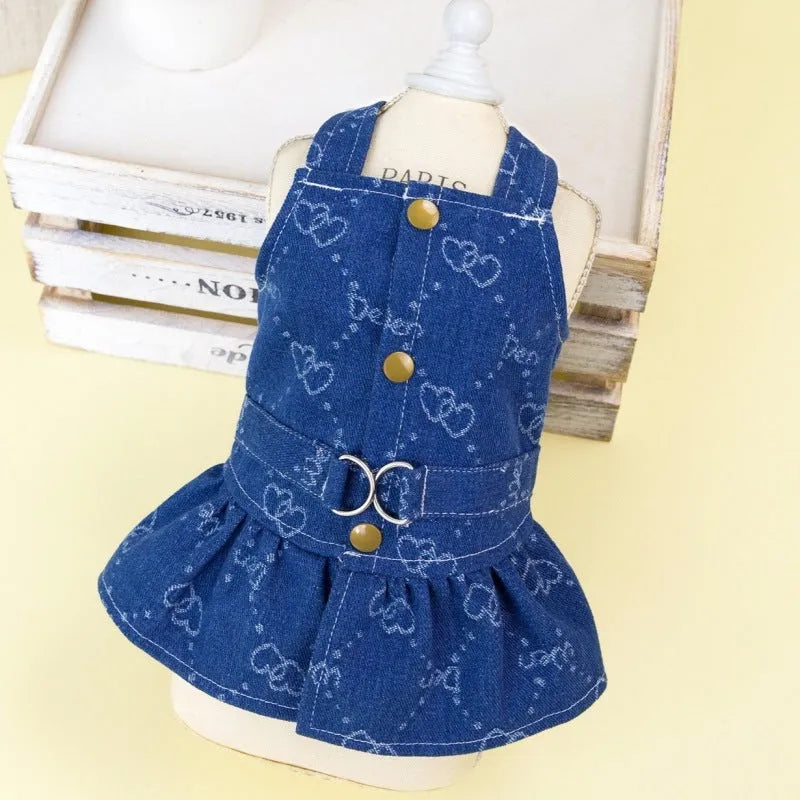 Denim princess dress for small dog on hanger showing bracket skirt style
