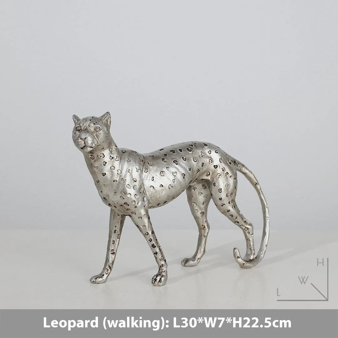 Resin leopard ornament in American Leopard colour on wooden shelf