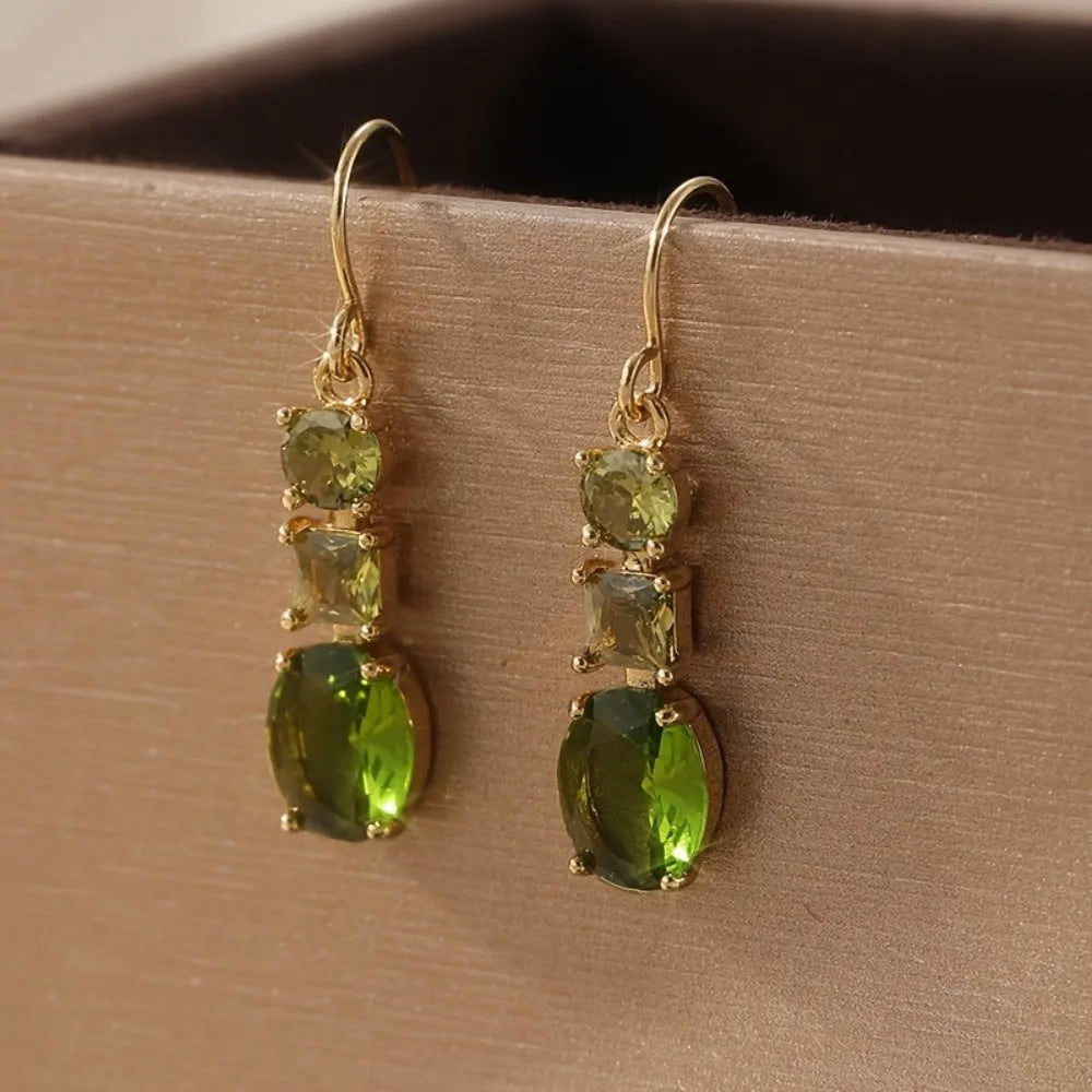 Green geometric quadrilateral copper earrings with retro bohemian styling for unisex wear
