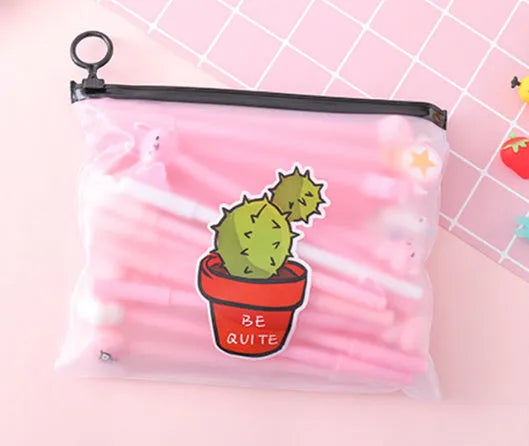 Set of twenty black 0.5mm gel pens with cartoon cactus designs in a plastic storage case measuring 21x17 cm