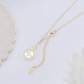 Gold titanium steel necklace with hexagonal star pendant on O-ring chain.