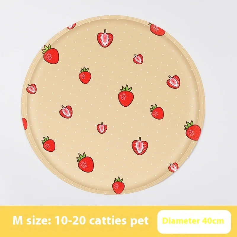 Round cartoon-design pet cooling mat for dogs on a floor, showing beige and blue colour options.