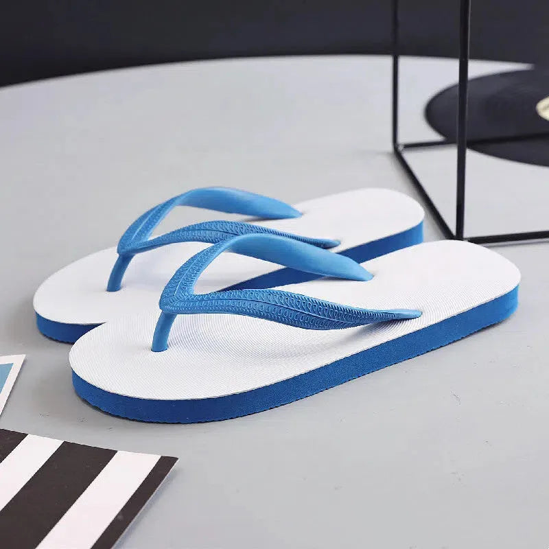 Colour options of rubber beach flip-flops with fish brand label, showing non-slip sole.