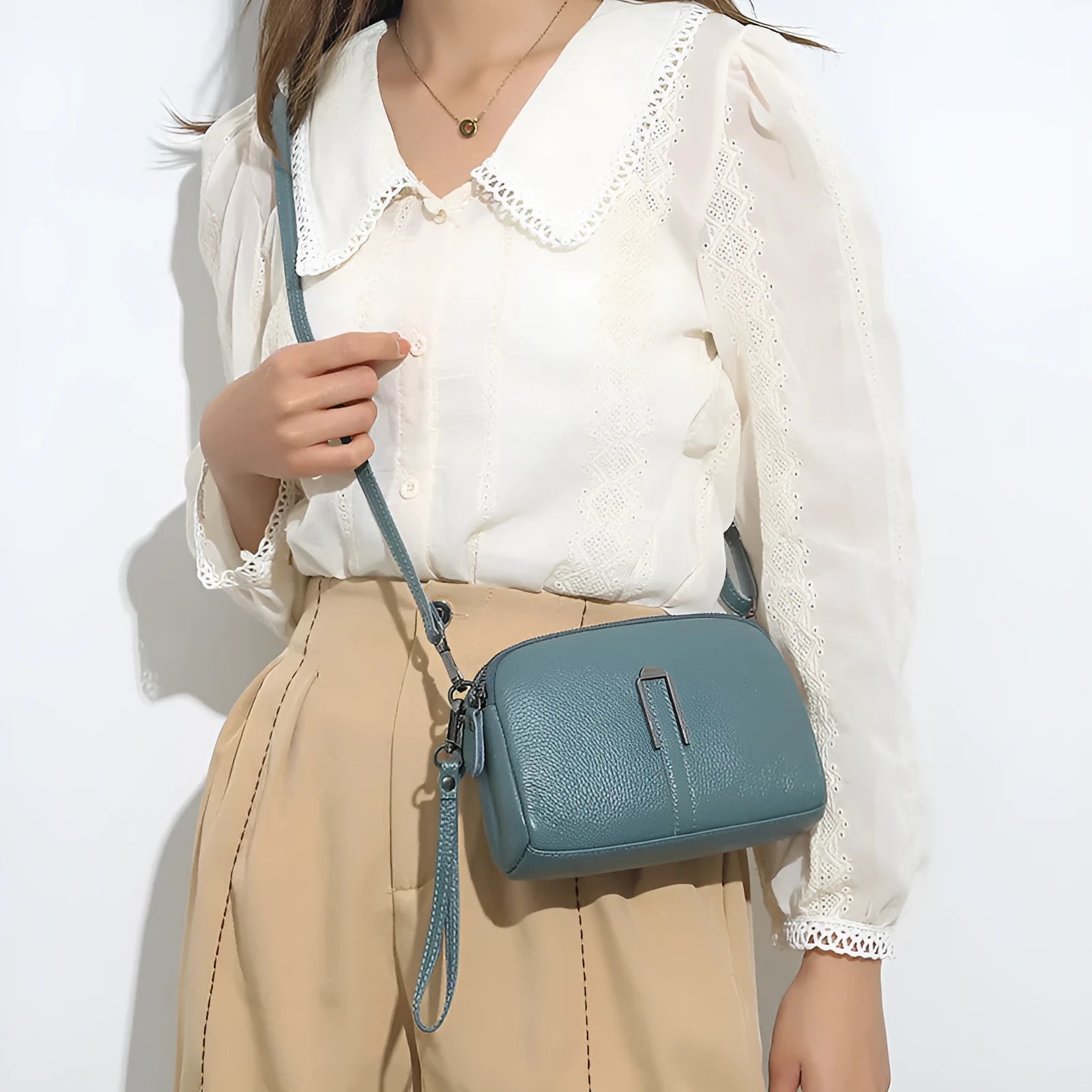 Women's genuine leather shoulder bag in square design with dimensions 19cm by 13cm by 6cm