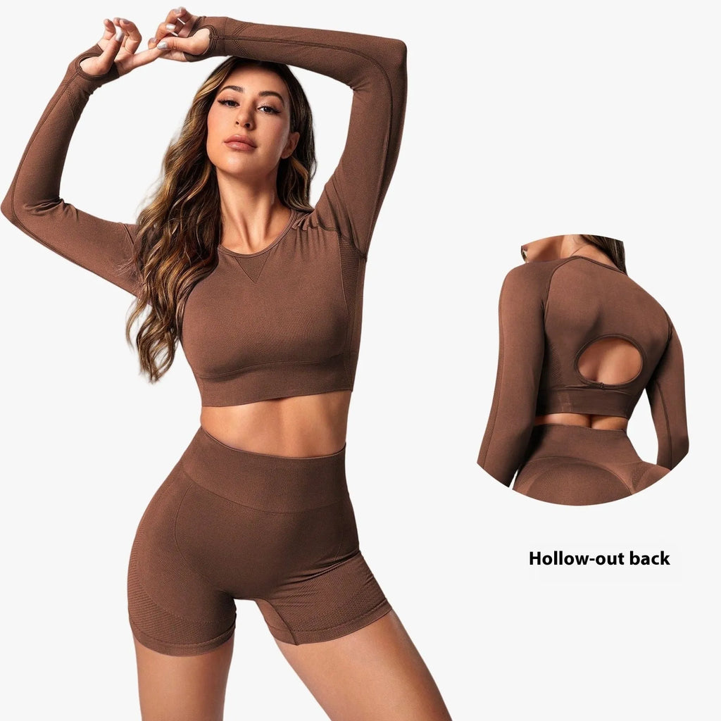 Women's black high-waisted yoga suit set with long sleeves and tight fit