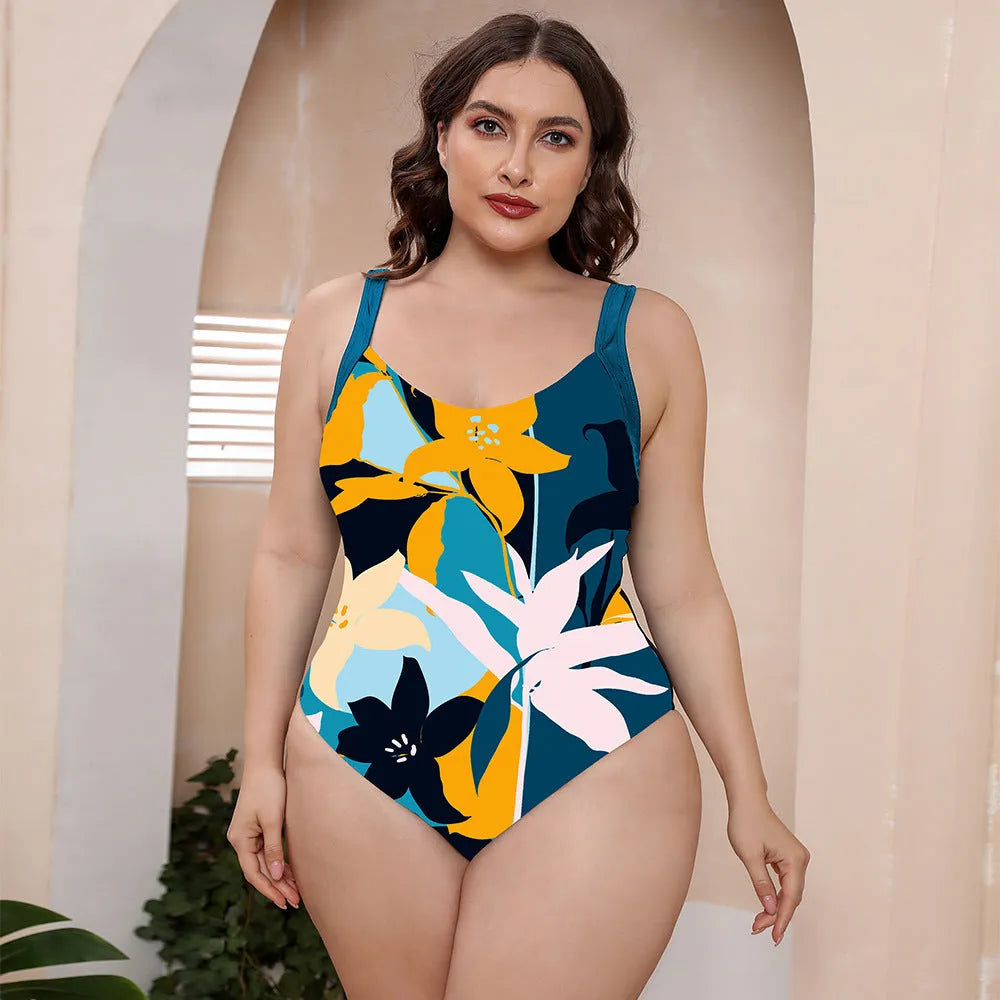 Women's vest style one-piece floral print swimsuit with spaghetti straps on a mannequin.