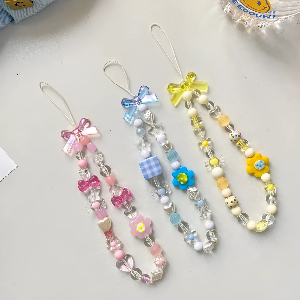 Colourful beaded flower mobile phone lanyard with hand rope and decorative floral elements