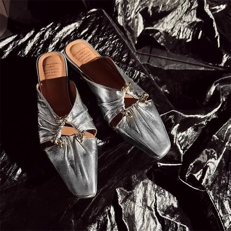 Women's genuine leather half toe cap slippers in silver with square toe and low TPR sole.