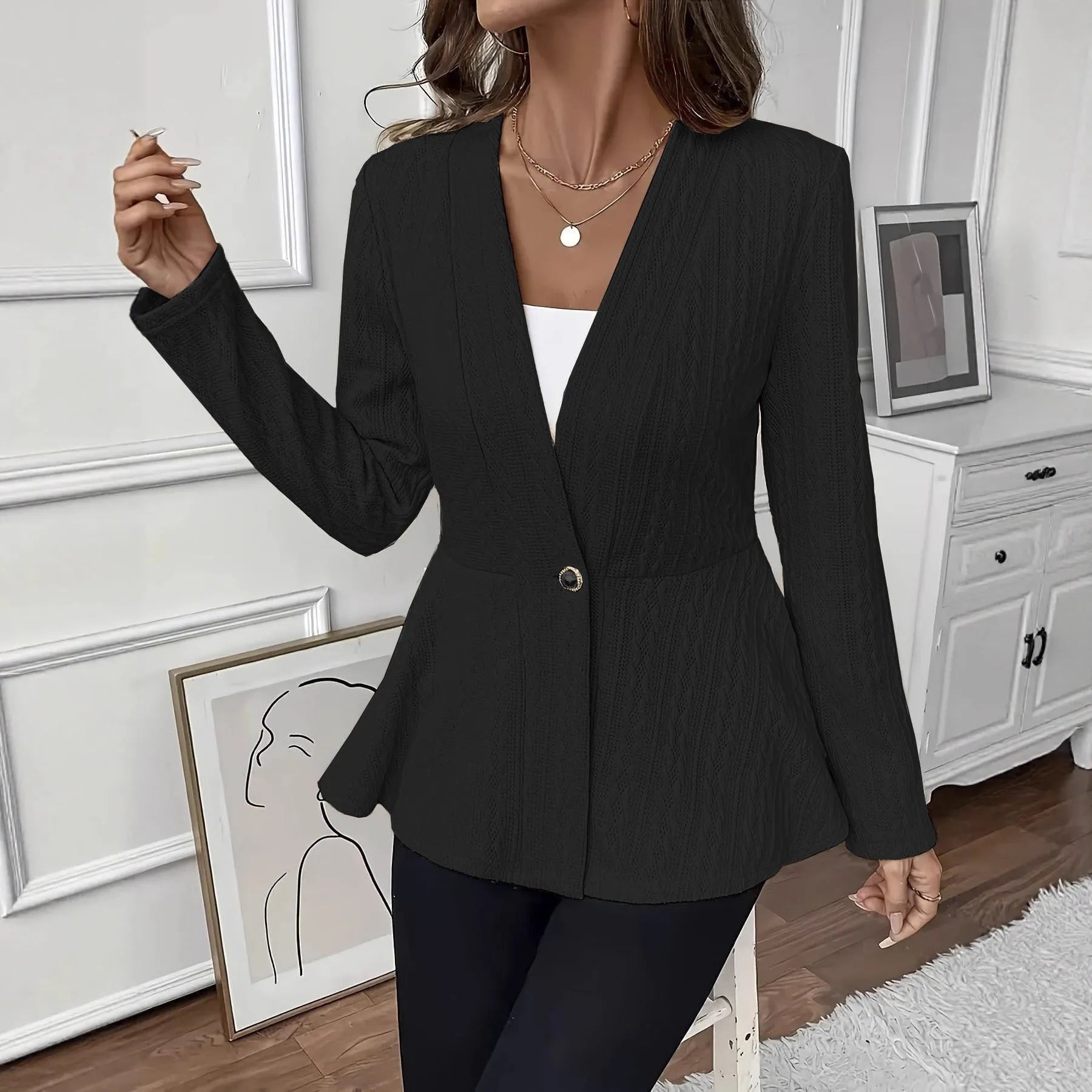 Women's apricot coloured tight fit knitted cardigan with jacquard pattern and one button front
