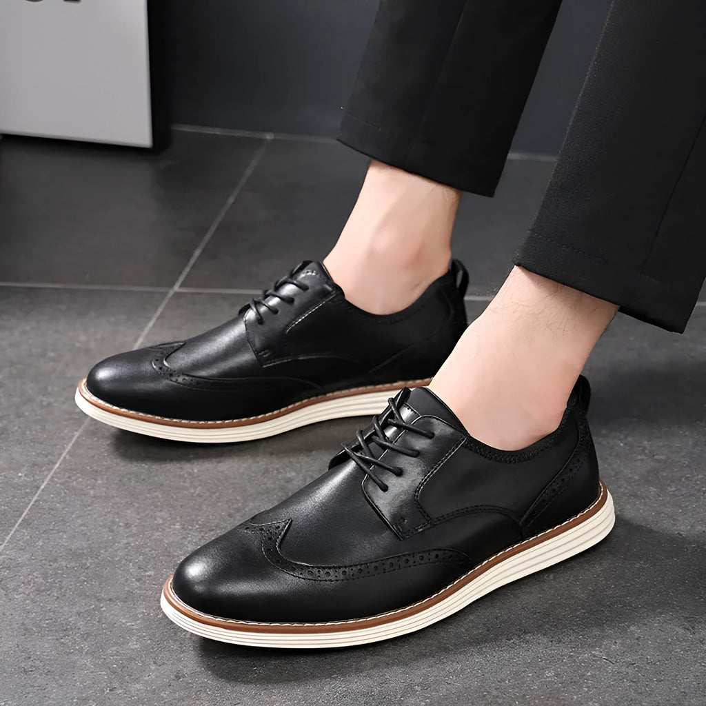 Men's black and brown slip-on business casual shoes with round toe and carving details on low-top PU upper