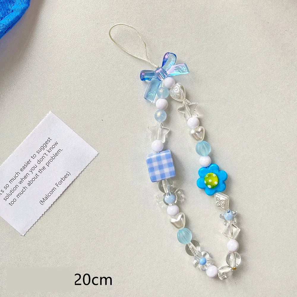 Colourful beaded flower mobile phone lanyard with hand rope and decorative floral elements