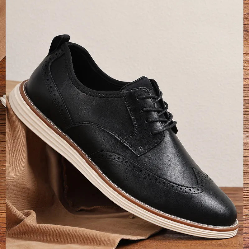 Men's black and brown slip-on business casual shoes with round toe and carving details on low-top PU upper