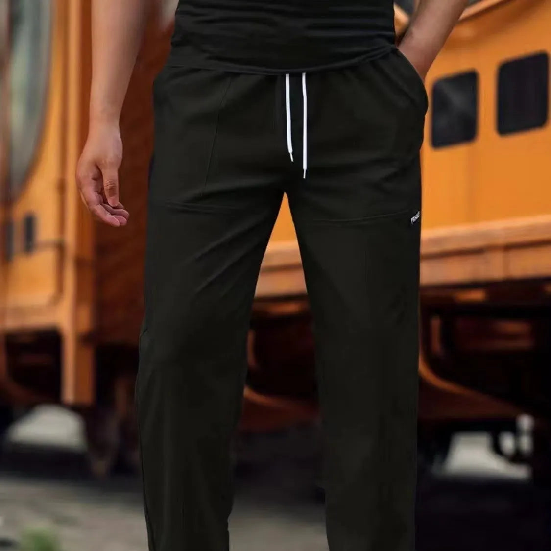 Men's polyester trousers for spring and autumn available in multiple colours and sizes