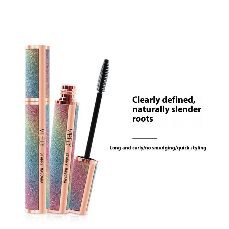 Black 4D long thick curling waterproof mascara tube and wand for volumised lashes.