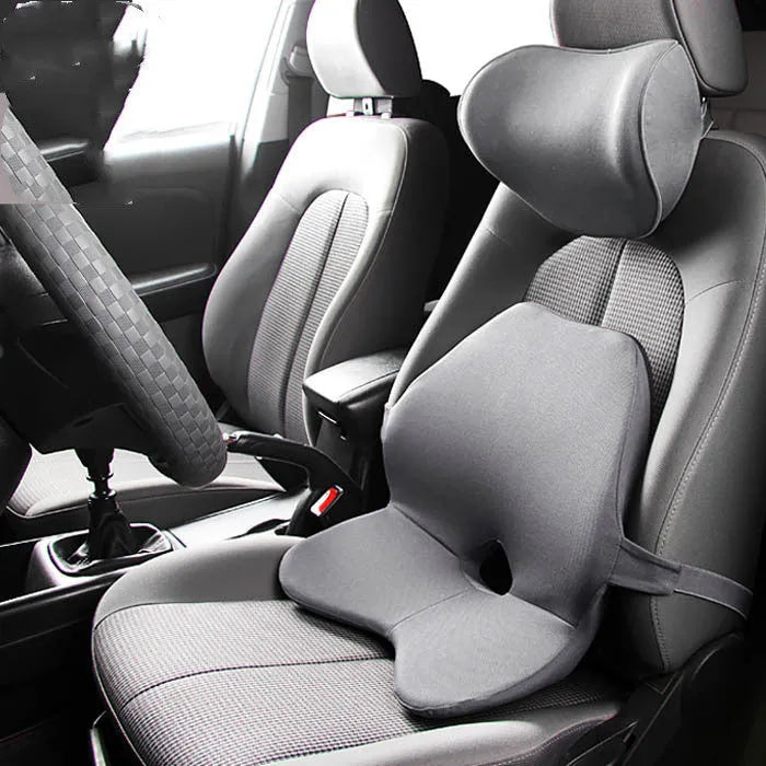 Memory foam car seat cushion set showing waist pad and headrest in neutral colours