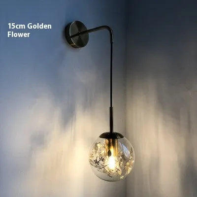Modern glass wall mounted bedside lamp with LED light in golden flower finish