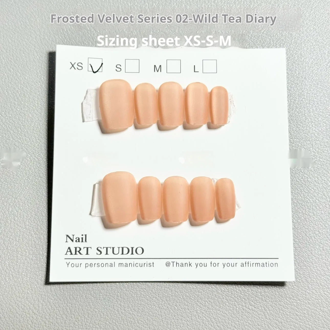 Velvet frosted Cat's Eye false nails with Aurora armour finish in short ladder XS, S, and M sizing options