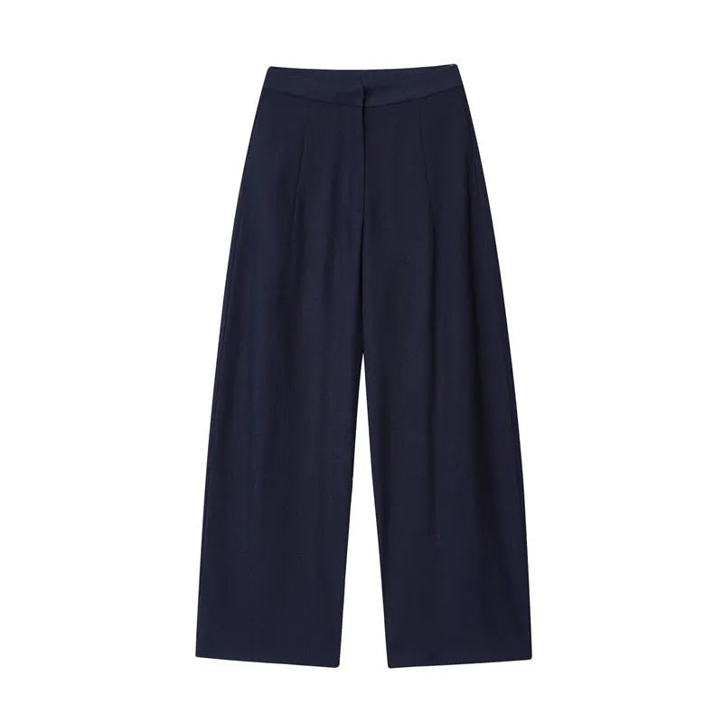 Women's linen blend two-piece set showing off-neck blouse with flounced sleeves and wide leg trousers