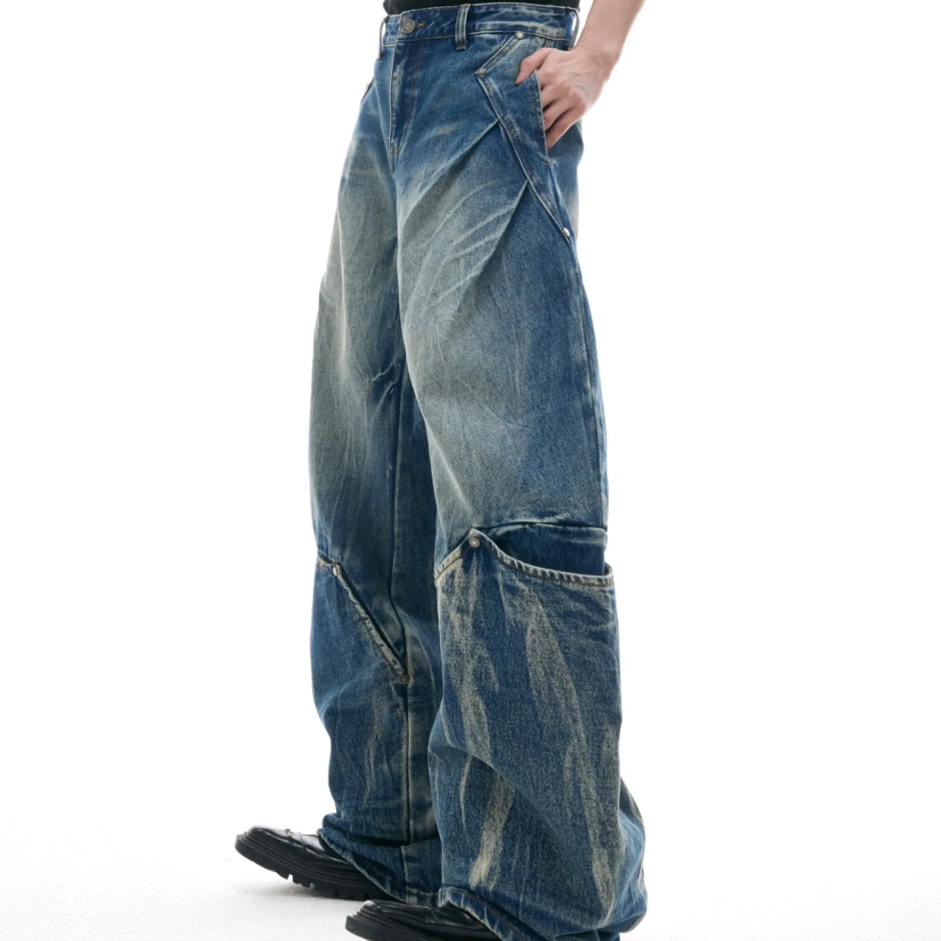 Men's verdant blue retro jeans with washed burst pattern, loose fit curved knife style