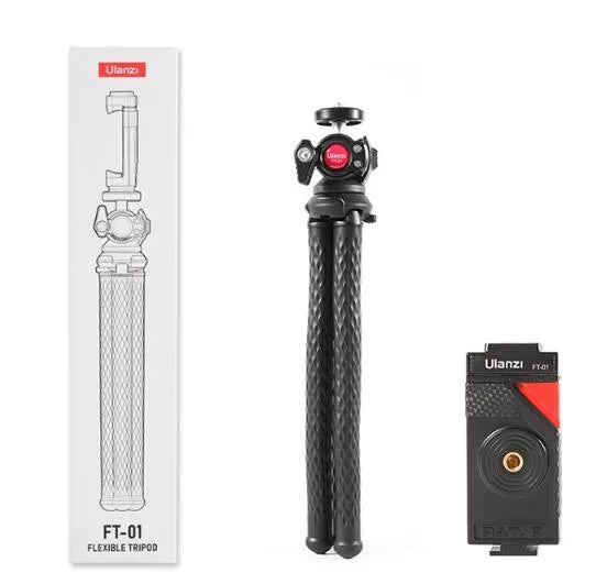 Black octopus tripod with mobile phone clip extended to 360mm length on a table