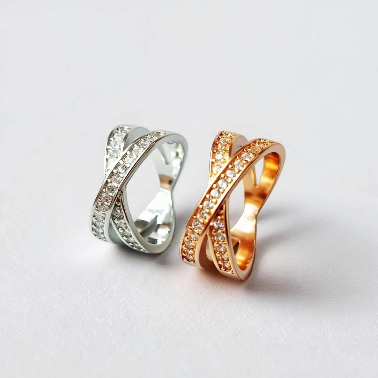 Geometric metal cross ring with micro-inlaid zircon stones in silver or rose gold finish