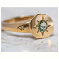 Gold oval asterism zircon ring with adjustable opening and star-shaped micro inlay design