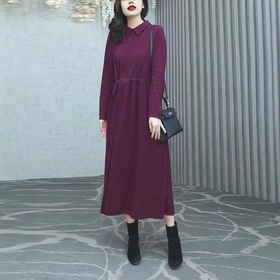 Purplish red plus size women's dress with long skirt and extra long sleeves for urban office wear