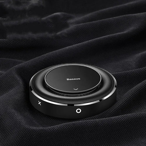 Aluminium car fragrance holder on dashboard with replaceable scent tablets