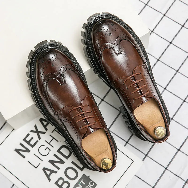 Men's black and brown brogue Oxford shoes with wingtip detailing and round toe