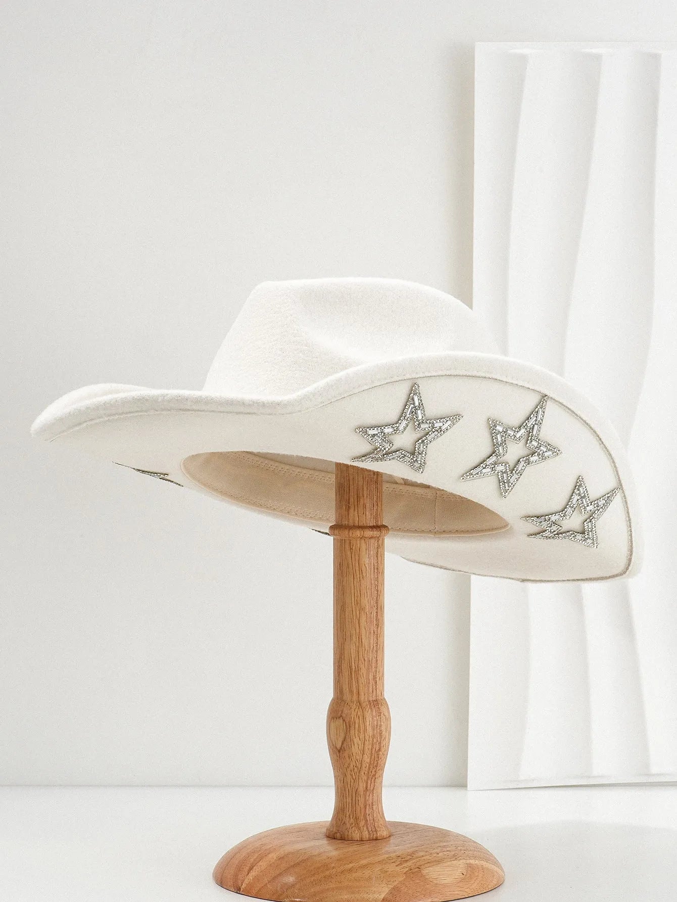 Polyester western top hat with hexagonal star design on conical crown in size M