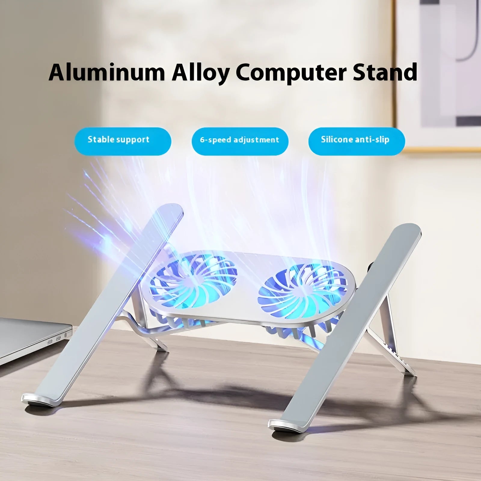 Silver aluminium folding laptop stand with twin cooling fans and adjustable height mechanism