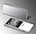 Ultra-thin portable MP3 player with a 2.4-inch touchscreen in choice of black, silver, blue, or red colours.