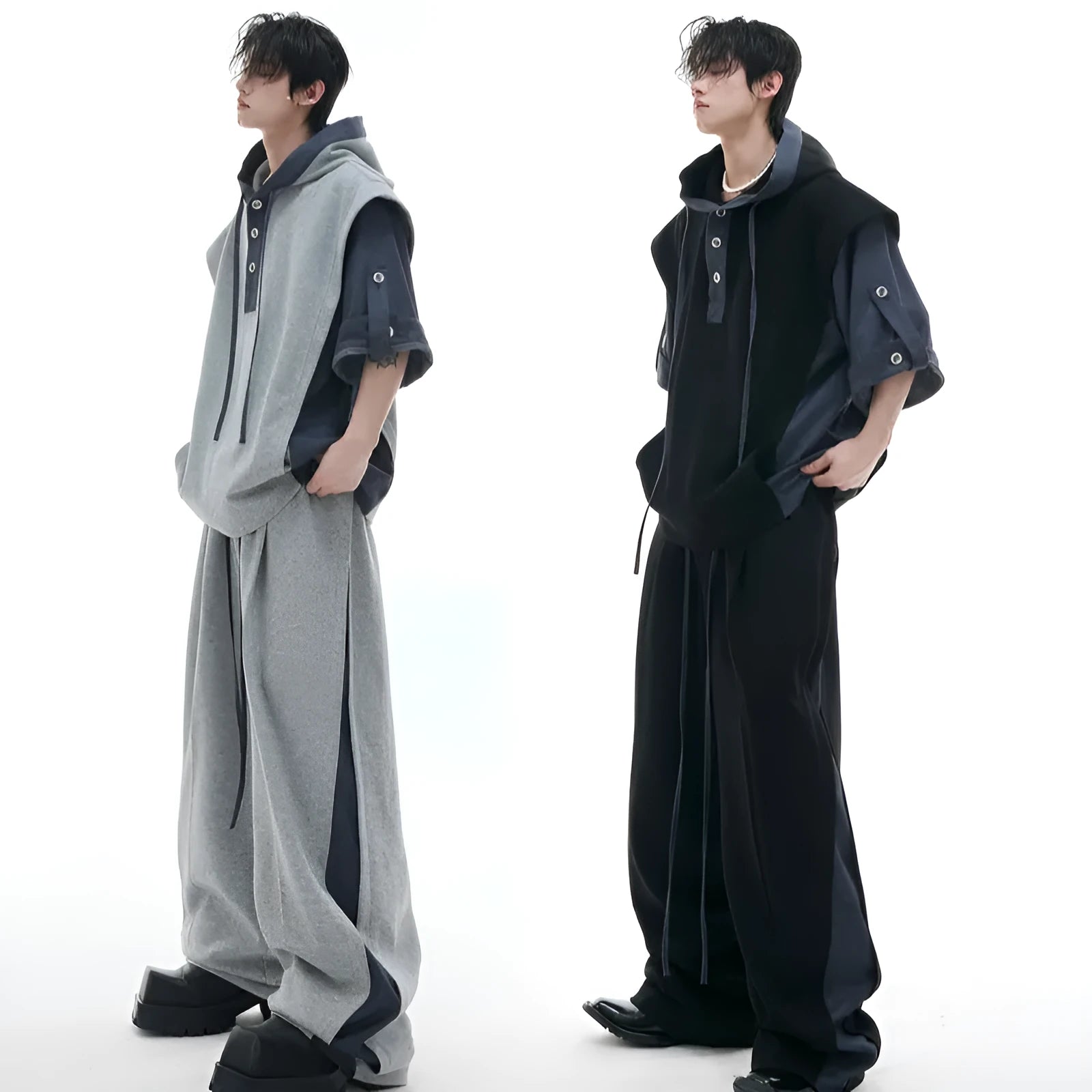 Men's hooded short sleeve sports suit with three-dimensional stitching on polyester jacket and matching trousers in black or grey
