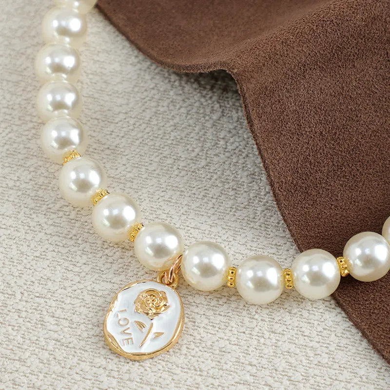 Retro plastic pearl necklace collar for pets with black rose flower design and adjustable scarf