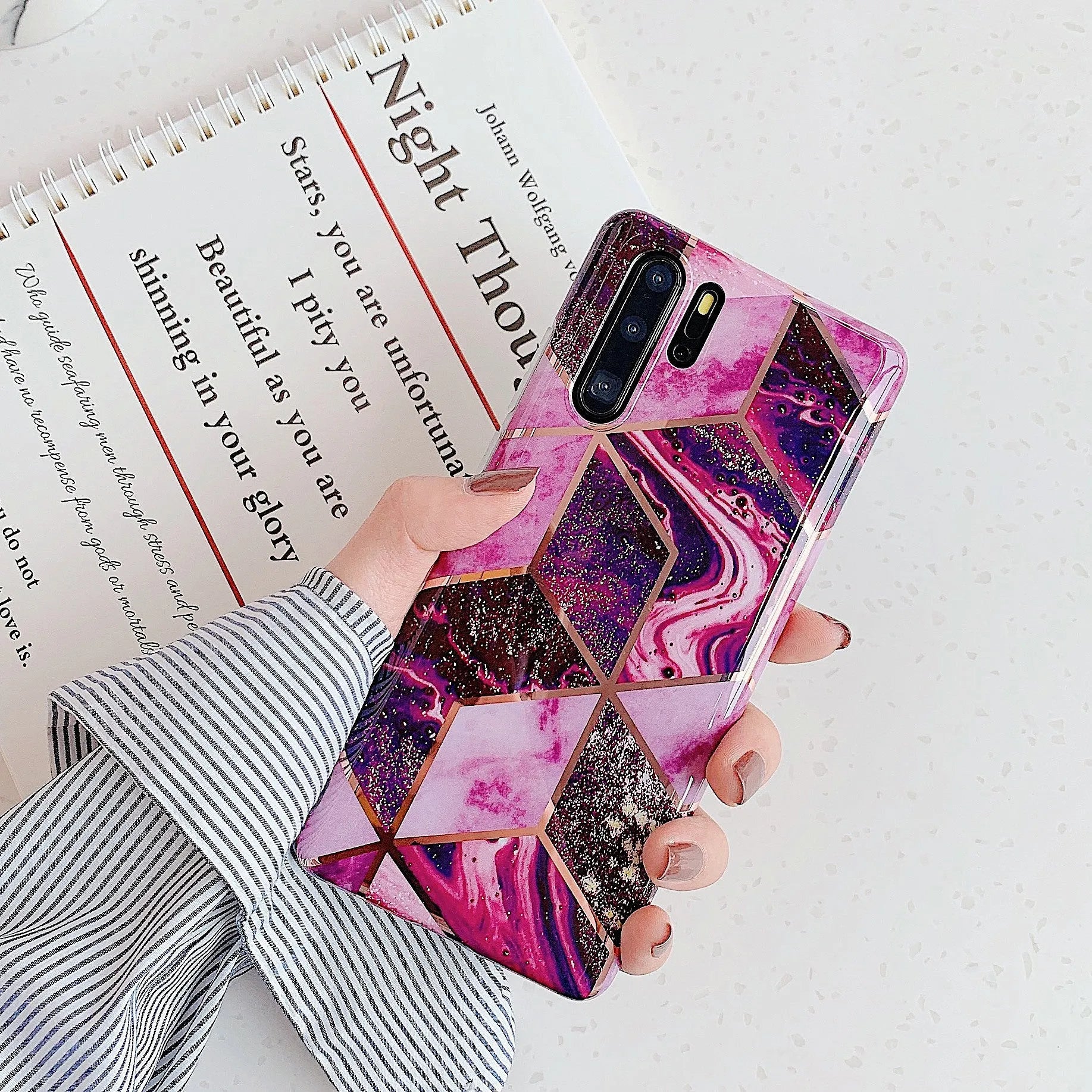 Electroplated marble pattern mobile phone case showing multiple colour options for Huawei and Samsung smartphones