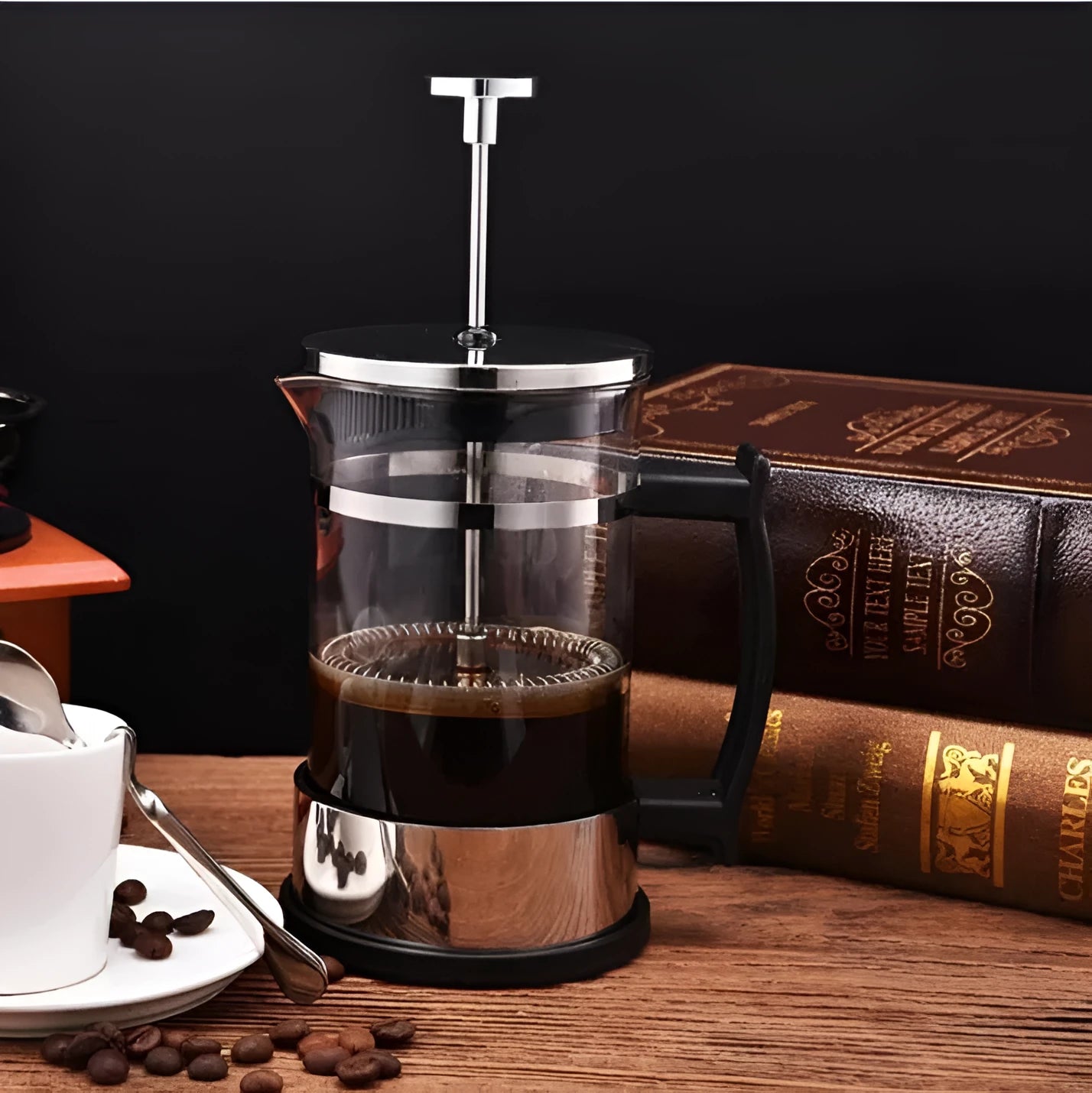 Compact glass and stainless steel cold brew coffee maker with 350ml capacity.