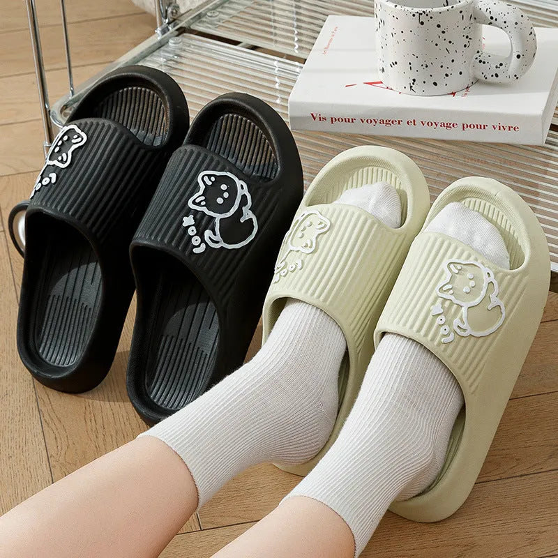 Green EVA cat flip-flop slippers with a thick platform sole on a white background.