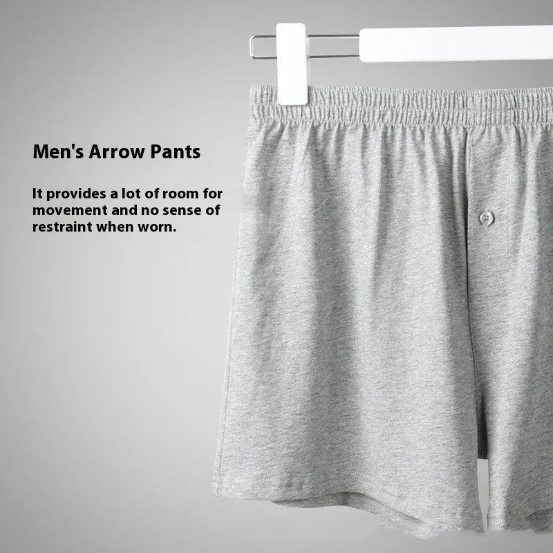 Men's high-waisted loose-fit cotton boxer shorts in black, grey, and navy blue.